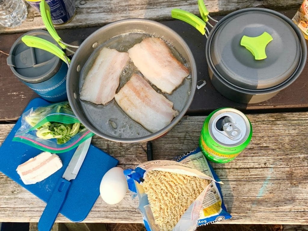 Cooking Pork in a camping pot