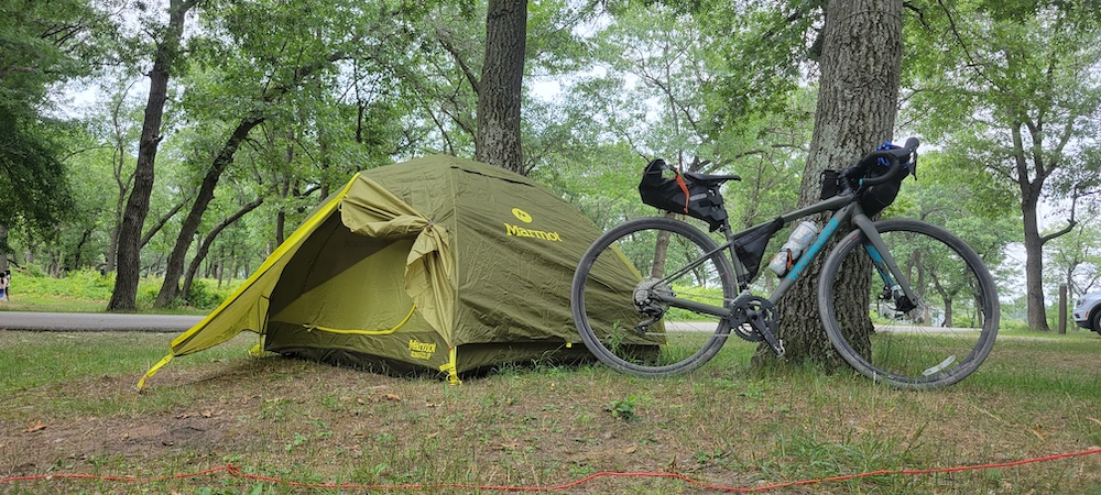 Bike and a tent at a campsite near Chicago