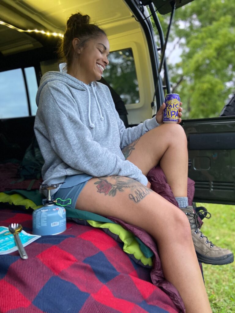 Drinking a beer while car camping