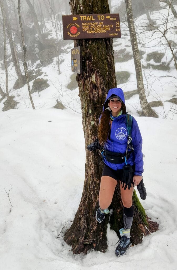 person hiking in snow