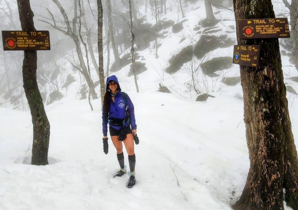 Woman in snowy woods
