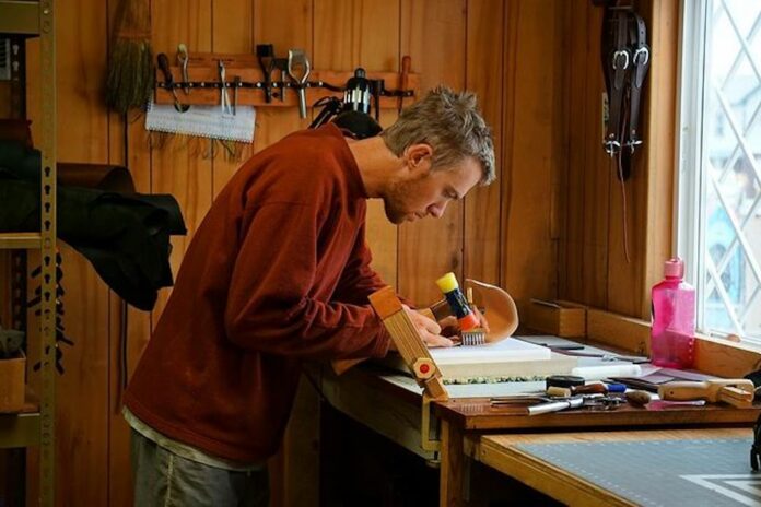 Hunter _ Workshop 1 copy Person works at a table